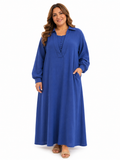Dress with small buttons.